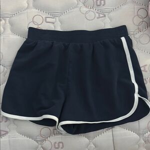 Blue Athletic Shorts with White Trim and Elastic Waistband